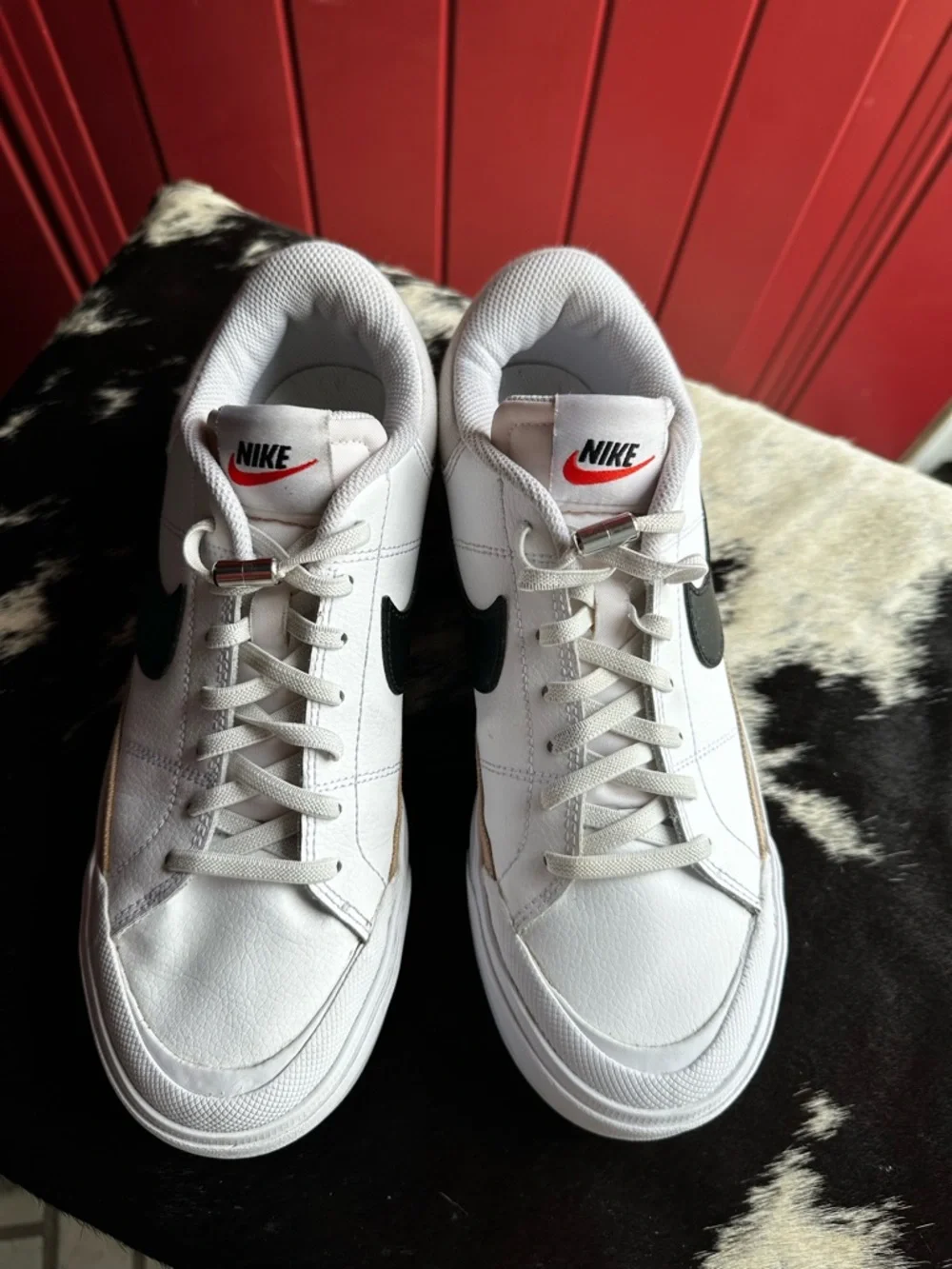 Nike White Low-Top Sneakers with Black Swoosh and Gold Trim - Picture 2 of 7